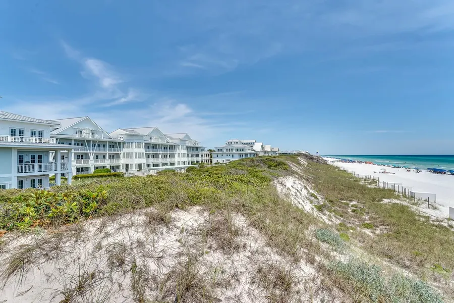 Gulf-front condos overlooking white sand dunes on the Emerald Coast