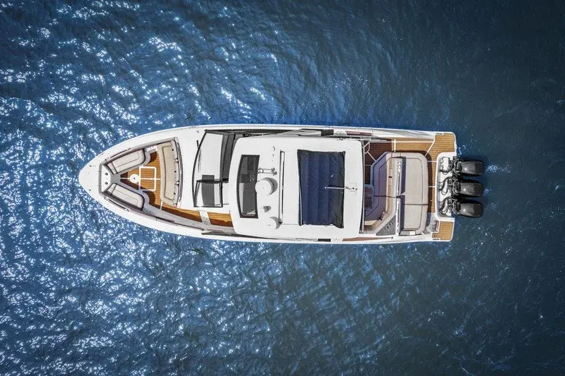 Straight-down aerial of a luxury boat with teak decks