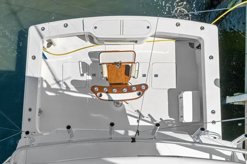 Aerial view of a sportfishing cockpit with fighting chair and rocket launchers